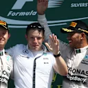 (L to R): Nico Rosberg (GER) Mercedes AMG F1, Peter Bonnington (GBR) Mercedes AMG F1 race engineer, race winner Lewis Hamilton (GBR) Mercedes AMG F1 and Sebastian Vettel (GER) Ferrari celebrate on the podium Formula One World Championship, Rd9, British Grand Prix, Race, Silverstone, England, Sunday 5 July 2015. © Sutton Motorsport Images