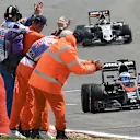 Fernando Alonso (ESP) McLaren MP4-30 passes the marshals at the end of the race at Formula One World Championship, Rd9, British Grand Prix, Race, Silverstone, England, Sunday 5 July 2015. © Sutton Motorsport Images