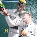 Race winner Lewis Hamilton (GBR) Mercedes AMG F1 and Nico Rosberg (GER) Mercedes AMG F1 celebrate on the podium with the champagne at Formula One World Championship, Rd9, British Grand Prix, Race, Silverstone, England, Sunday 5 July 2015. © Sutton Motorsport Images