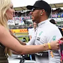 Lewis Hamilton (GBR) Mercedes AMG F1 with Lindsey Vonn (USA) Alpine Ski Racer at Formula One World Championship, Rd9, British Grand Prix, Race, Silverstone, England, Sunday 5 July 2015. © Sutton Motorsport Images