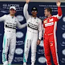 (L to R): Nico Rosberg (GER) Mercedes AMG F1 , pole sitter Lewis Hamilton (GBR) Mercedes AMG F1 and Sebastian Vettel (GER) Ferrari celebrate in parc ferme at Formula One World Championship, Rd3, Chinese Grand Prix, Qualifying, Shanghai, China, Saturday 11 April 2015. © Sutton Motorsport Images