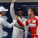 (L to R): Nico Rosberg (GER) Mercedes AMG F1, pole sitter Lewis Hamilton (GBR) Mercedes AMG F1 and Sebastian Vettel (GER) Ferrari celebrate in parc ferme at Formula One World Championship, Rd3, Chinese Grand Prix, Qualifying, Shanghai, China, Saturday 11 April 2015. © Sutton Motorsport Images