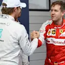 Nico Rosberg (GER) Mercedes AMG F1 shakes hands with Sebastian Vettel (GER) Ferrari in Parc Ferme at Formula One World Championship, Rd3, Chinese Grand Prix, Qualifying, Shanghai, China, Saturday 11 April 2015. © Sutton Motorsport Images