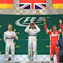 (L to R): Nico Rosberg (GER) Mercedes AMG F1, race winner Lewis Hamilton (GBR) Mercedes AMG F1 and Sebastian Vettel (GER) Ferrari celebrate on the podium at Formula One World Championship, Rd3, Chinese Grand Prix, Race, Shanghai, China, Sunday 12 April 2015. © Sutton Motorsport Images