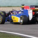 Daniel Ricciardo (AUS) Red Bull Racing RB11 and Marcus Ericsson (SWE) Sauber C34 battle at Formula One World Championship, Rd3, Chinese Grand Prix, Race, Shanghai, China, Sunday 12 April 2015. © Sutton Motorsport Images