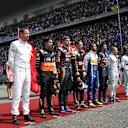 Drivers observe the National Anthem on the grid at Formula One World Championship, Rd3, Chinese Grand Prix, Race, Shanghai, China, Sunday 12 April 2015. © Sutton Motorsport Images