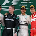 (L to R): Nico Rosberg (GER) Mercedes AMG F1, Lewis Hamilton (GBR) Mercedes AMG F1 and Sebastian Vettel (GER) Ferrari celebrate on the podium at Formula One World Championship, Rd3, Chinese Grand Prix, Race, Shanghai, China, Sunday 12 April 2015. © Sutton Motorsport Images