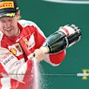 Sebastian Vettel (GER) Ferrari celebrates with champagne on the podium at Formula One World Championship, Rd3, Chinese Grand Prix, Race, Shanghai, China, Sunday 12 April 2015. © Sutton Motorsport Images