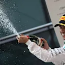 Race winner Lewis Hamilton (GBR) Mercedes AMG F1 celebrates with champagne on the podium at Formula One World Championship, Rd3, Chinese Grand Prix, Race, Shanghai, China, Sunday 12 April 2015. © Sutton Motorsport Images