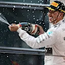 Race winner Lewis Hamilton (GBR) Mercedes AMG F1 celebrates with champagne on the podium at Formula One World Championship, Rd3, Chinese Grand Prix, Race, Shanghai, China, Sunday 12 April 2015. © Sutton Motorsport Images