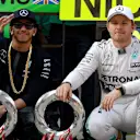 Lewis Hamilton (GBR) Mercedes AMG F1 and Nico Rosberg (GER) Mercedes AMG F1 during the team celebration at Formula One World Championship, Rd3, Chinese Grand Prix, Race, Shanghai, China, Sunday 12 April 2015. © Sutton Motorsport Images