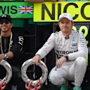 Lewis Hamilton (GBR) Mercedes AMG F1 and Nico Rosberg (GER) Mercedes AMG F1 during the team celebration at Formula One World Championship, Rd3, Chinese Grand Prix, Race, Shanghai, China, Sunday 12 April 2015. © Sutton Motorsport Images