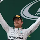 Nico Rosberg (GER) Mercedes AMG F1 celebrates with his trophy on the podium at Formula One World Championship, Rd3, Chinese Grand Prix, Race, Shanghai, China, Sunday 12 April 2015. © Sutton Motorsport Images
