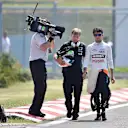 Sergio Perez (MEX) Force India walks in with his trainer Xavi Martos (ESP) after crashing and rolling in FP1 at Formula One World Championship, Rd10, Hungarian Grand Prix, Practice, Hungaroring, Hungary, Friday 24 July 2015. © Sutton Motorsport Images