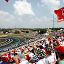 Kimi Raikkonen (FIN) Ferrari SF15-T passes Ferrari fans and flags at Formula One World Championship, Rd10, Hungarian Grand Prix, Qualifying, Hungaroring, Hungary, Saturday 25 July 2015. © Sutton Motorsport Images