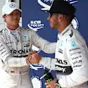 Nico Rosberg (GER) Mercedes AMG F1 congratulates pole sitter Lewis Hamilton (GBR) Mercedes AMG F1 in parc ferme at Formula One World Championship, Rd10, Hungarian Grand Prix, Qualifying, Hungaroring, Hungary, Saturday 25 July 2015. © Sutton Motorsport Images