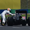 Fernando Alonso (ESP) McLaren MP4-30 pushing his car at Formula One World Championship, Rd10, Hungarian Grand Prix, Qualifying, Hungaroring, Hungary, Saturday 25 July 2015. © Sutton Motorsport Images