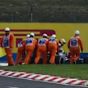 Marshals and Fernando Alonso (ESP) McLaren MP4-30 push his car into pit lane during Q2 at Formula One World Championship, Rd10, Hungarian Grand Prix, Qualifying, Hungaroring, Hungary, Saturday 25 July 2015. © Sutton Motorsport Images