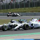 Lewis Hamilton (GBR) Mercedes AMG F1 W06 battles with Valtteri Bottas (FIN) Williams FW37 at Formula One World Championship, Rd10, Hungarian Grand Prix, Race, Hungaroring, Hungary, Sunday 26 July 2015. © Sutton Motorsport Images
