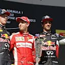 (L to R): Daniil Kyvat (RUS) Red Bull Racing, Race winner Sebastian Vettel (GER) Ferrari and Daniel Ricciardo (AUS) Red Bull Racing celebrate with the trophy on the podium at Formula One World Championship, Rd10, Hungarian Grand Prix, Race, Hungaroring, Hungary, Sunday 26 July 2015. © Sutton Motorsport Images