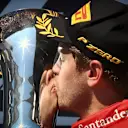 Race winner Sebastian Vettel (GER) Ferrari celebrates and kisses the trophy on the podium at Formula One World Championship, Rd10, Hungarian Grand Prix, Race, Hungaroring, Hungary, Sunday 26 July 2015. © Sutton Motorsport Images