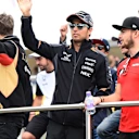 Sergio Perez (MEX) Force India and Will Stevens (GBR) Marussia on the drivers parade at Formula One World Championship, Rd10, Hungarian Grand Prix, Race, Hungaroring, Hungary, Sunday 26 July 2015. © Sutton Motorsport Images