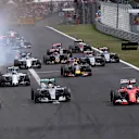 Nico Rosberg (GER) Mercedes AMG F1 W06, Lewis Hamilton (GBR) Mercedes AMG F1 W06, Sebastian Vettel (GER) Ferrari SF15-T and Kimi Raikkonen (FIN) Ferrari SF15-T at the start of the race at Formula One World Championship, Rd10, Hungarian Grand Prix, Race, Hungaroring, Hungary, Sunday 26 July 2015. © Sutton Motorsport Images