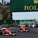 Sebastian Vettel (GER) Ferrari SF15-T leads at the start of the race at Formula One World Championship, Rd10, Hungarian Grand Prix, Race, Hungaroring, Hungary, Sunday 26 July 2015. © Sutton Motorsport Images