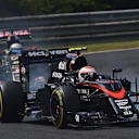 Jenson Button (GBR) McLaren MP4-30 leads Romain Grosjean (FRA) Lotus E23 Hybrid at Formula One World Championship, Rd10, Hungarian Grand Prix, Race, Hungaroring, Hungary, Sunday 26 July 2015. © Sutton Motorsport Images