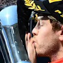 Race winner Sebastian Vettel (GER) Ferrari kisses the trophy on the Podium at Formula One World Championship, Rd10, Hungarian Grand Prix, Race, Hungaroring, Hungary, Sunday 26 July 2015. © Sutton Motorsport Images