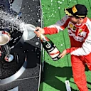 Race winner Sebastian Vettel (GER) Ferrari celebrates on the podium with the champagne at Formula One World Championship, Rd10, Hungarian Grand Prix, Race, Hungaroring, Hungary, Sunday 26 July 2015. © Sutton Motorsport Images