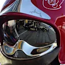 Pastor Maldonado (VEN) Lotus E23 Hybrid reflected in a firemans helmet at Formula One World Championship, Rd12, Italian Grand Prix, Qualifying, Monza, Italy, Saturday 5  September 2015. © Sutton Motorsport Images