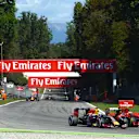 Daniel Ricciardo (AUS) Red Bull Racing RB11 battles with Kimi Raikkonen (FIN) Ferrari SF15-T for position at Formula One World Championship, Rd12, Italian Grand Prix, Race, Monza, Italy, Sunday 6  September 2015. © Sutton Motorsport Images