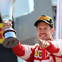Sebastian Vettel (GER) Ferrari celebrates with the trophy on the podium at Formula One World Championship, Rd12, Italian Grand Prix, Race, Monza, Italy, Sunday 6  September 2015. © Sutton Motorsport Images