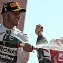 Race winner Lewis Hamilton (GBR) Mercedes AMG F1 celebrates with champagne on the podium at Formula One World Championship, Rd12, Italian Grand Prix, Race, Monza, Italy, Sunday 6  September 2015. © Sutton Motorsport Images