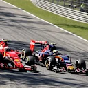 Kimi Raikkonen (FIN) Ferrari SF15-T and Carlos Sainz jr (ESP) Scuderia Toro Rosso STR10 battle at Formula One World Championship, Rd12, Italian Grand Prix, Race, Monza, Italy, Sunday 6  September 2015. © Sutton Motorsport Images