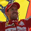Sebastian Vettel (GER) Ferrari celebrates with the Ferrari flag on the podium at Formula One World Championship, Rd12, Italian Grand Prix, Race, Monza, Italy, Sunday 6  September 2015. © Sutton Motorsport Images