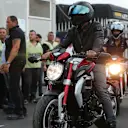Lewis Hamilton (GBR) Mercedes AMG F1 arrives on a motorcycle at Formula One World Championship, Rd12, Italian Grand Prix, Preparations, Monza, Italy, Thursday 3 September 2015. © Sutton Motorsport Images