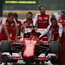 Ferrari mechanics with Ferrari SF15-T at Formula One World Championship, Rd14, Japanese Grand Prix, Practice, Suzuka, Japan, Friday 25 September 2015. © Sutton Motorsport Images