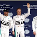 (L to R): Lewis Hamilton (GBR) Mercedes AMG F1, Pole sitter Nico Rosberg (GER) Mercedes AMG F1 and Valtteri Bottas (FIN) Williams celebrate in parc ferme at Formula One World Championship, Rd14, Japanese Grand Prix, Qualifying, Suzuka, Japan, Saturday 26 September 2015. © Sutton Motorsport Images