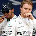 Nico Rosberg (GER) Mercedes AMG F1 and Lewis Hamilton (GBR) Mercedes AMG F1 celebrate in the parc ferme at Formula One World Championship, Rd14, Japanese Grand Prix, Qualifying, Suzuka, Japan, Saturday 26 September 2015. © Sutton Motorsport Images