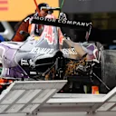 The crashed car of Daniil Kvyat (RUS) Red Bull Racing RB11 is recovered to the pits after Q3 at Formula One World Championship, Rd14, Japanese Grand Prix, Qualifying, Suzuka, Japan, Saturday 26 September 2015. © Sutton Motorsport Images