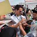 Adrian Sutil (GER) Williams Reserve Driver signs autographs for the fans at Formula One World Championship, Rd14, Japanese Grand Prix, Qualifying, Suzuka, Japan, Saturday 26 September 2015. © Sutton Motorsport Images