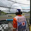 Marshal watches Sergio Perez (MEX) Force India VJM08 at Formula One World Championship, Rd14, Japanese Grand Prix, Qualifying, Suzuka, Japan, Saturday 26 September 2015. © Sutton Motorsport Images