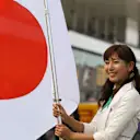 Grid girl and the Japanese Flag on the grid at Formula One World Championship, Rd14, Japanese Grand Prix, Race, Suzuka, Japan, Sunday 27 September 2015. © Sutton Motorsport Images