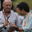 Ron Dennis (GBR) McLaren Executive Chairman signs autographs for the fans at Formula One World Championship, Rd14, Japanese Grand Prix, Race, Suzuka, Japan, Sunday 27 September 2015. © Sutton Motorsport Images