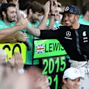 Race winner Lewis Hamilton (GBR) Mercedes AMG F1 celebrates with the team at Formula One World Championship, Rd14, Japanese Grand Prix, Race, Suzuka, Japan, Sunday 27 September 2015. © Sutton Motorsport Images