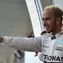 Lewis Hamilton (GBR) Mercedes AMG F1 and Sebastian Vettel (GER) Ferrari celebrate on the podium at Formula One World Championship, Rd14, Japanese Grand Prix, Race, Suzuka, Japan, Sunday 27 September 2015. © Sutton Motorsport Images