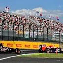 Daniil Kvyat (RUS) Red Bull Racing RB11 leads Max Verstappen (NDL) Scuderia Toro Rosso STR10 at Formula One World Championship, Rd14, Japanese Grand Prix, Race, Suzuka, Japan, Sunday 27 September 2015. © Sutton Motorsport Images