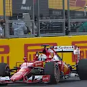Sebastian Vettel (GER) Ferrari SF15-T crosses the line at Formula One World Championship, Rd14, Japanese Grand Prix, Race, Suzuka, Japan, Sunday 27 September 2015. © Sutton Motorsport Images